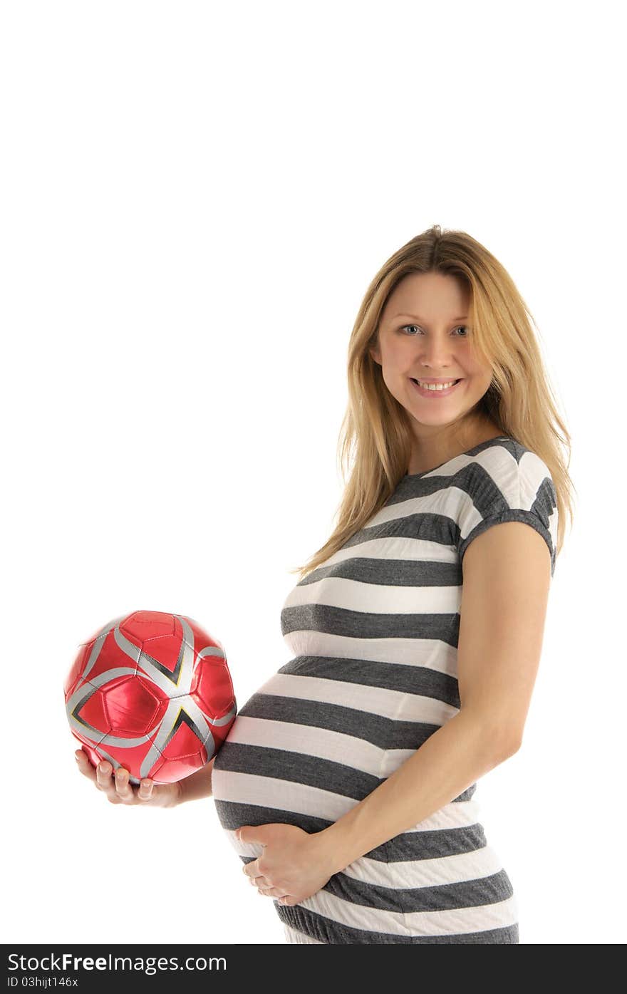 Pregnant woman with soccer ball