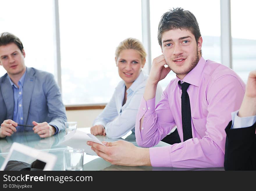 Group Of Business People At Meeting