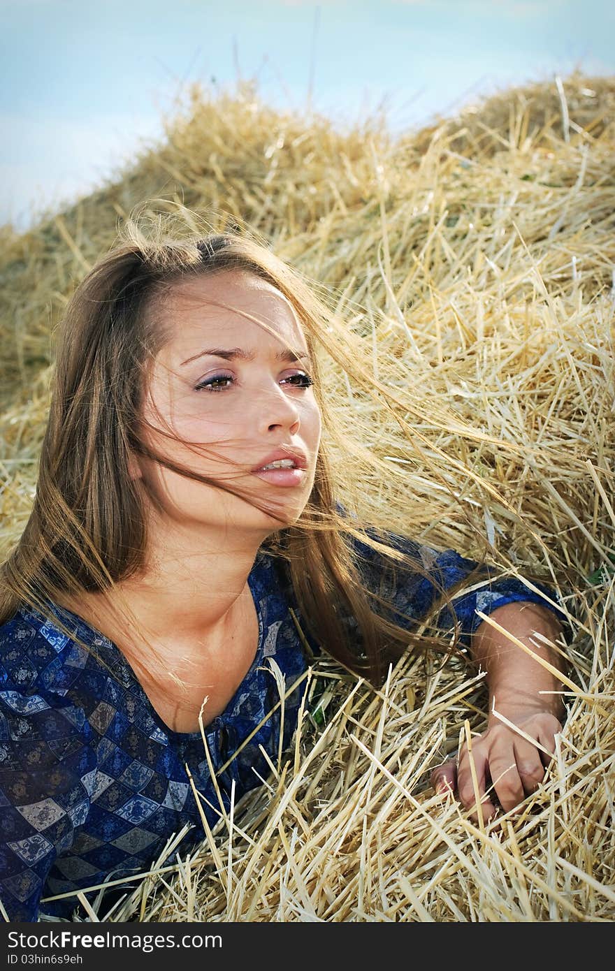 Girl in the hay, straw