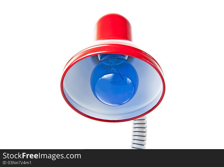 Red table lamp on white