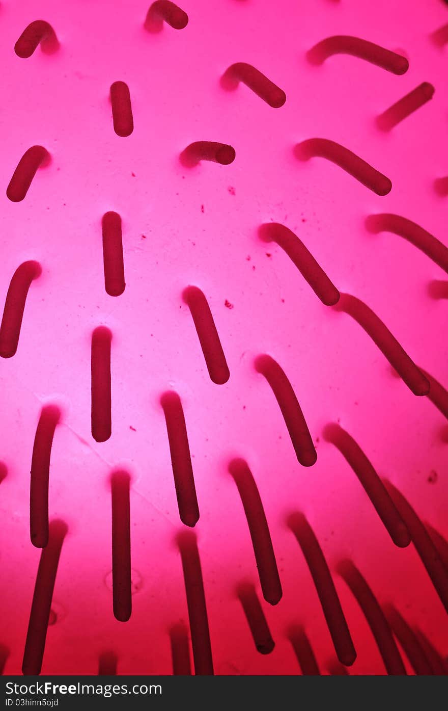 Macro shot of rubber ball with stringy tips