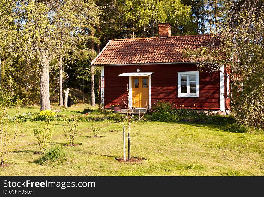 Idyllic Swedish house. typical old wooden, painted red and white. Idyllic Swedish house. typical old wooden, painted red and white.