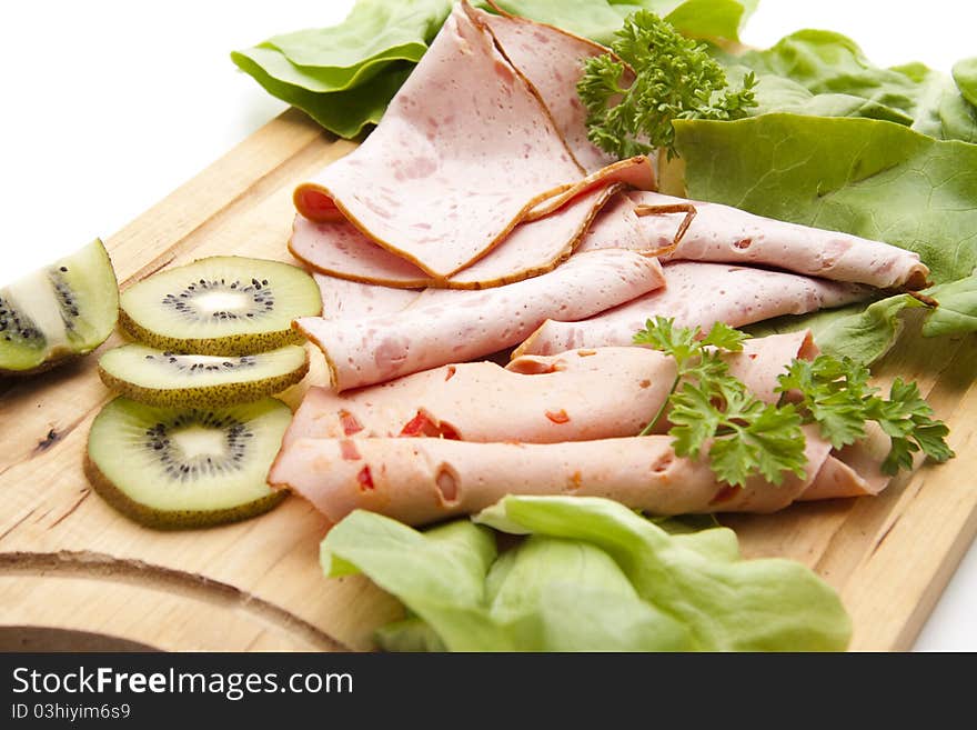 Different liver cheese sorts onto wood plates