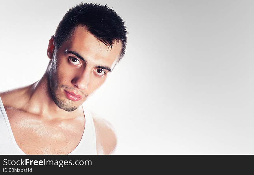 Soak wet young handsome men, studio shot