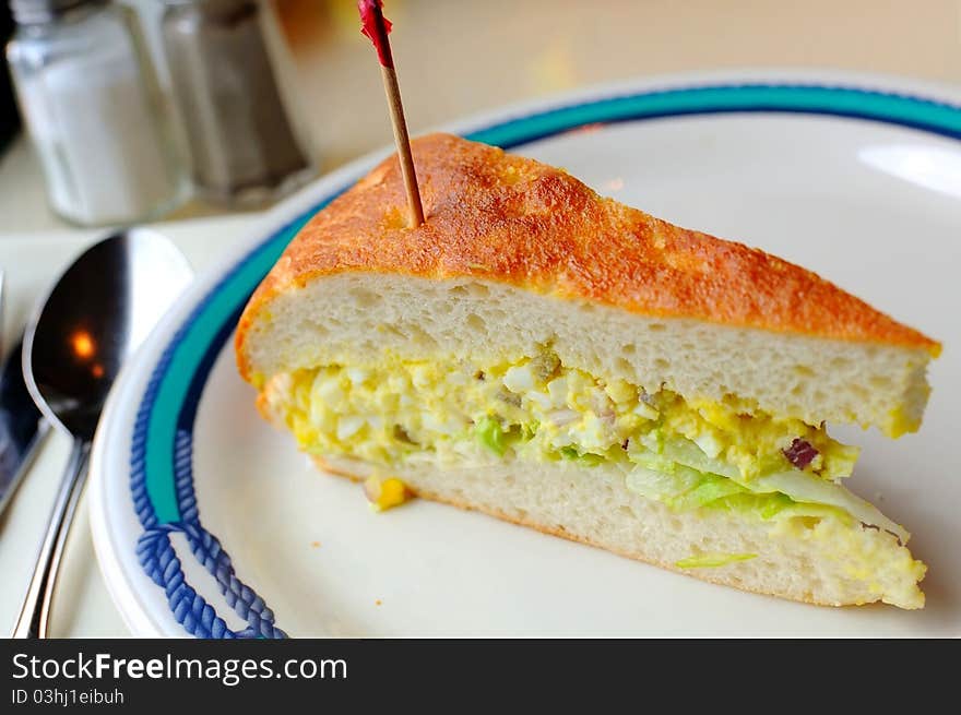 Single serving of delicious healthy sandwich on plate. Single serving of delicious healthy sandwich on plate.