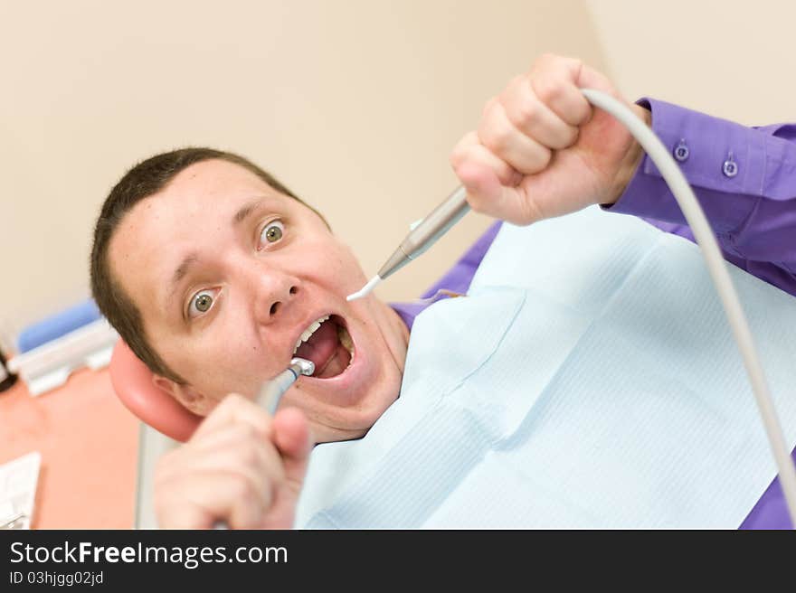 Man waiting for a dentist in stomatology place. Man waiting for a dentist in stomatology place