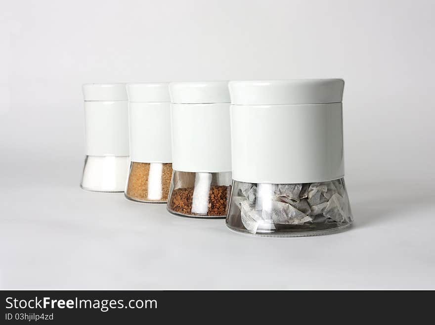 Modern pots of tea, coffee and sugars