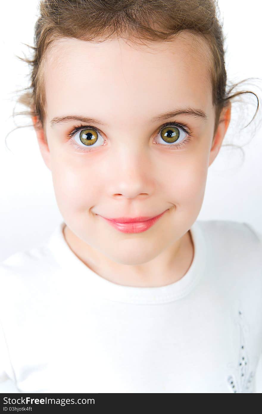 Portrait of a pretty little girl over white