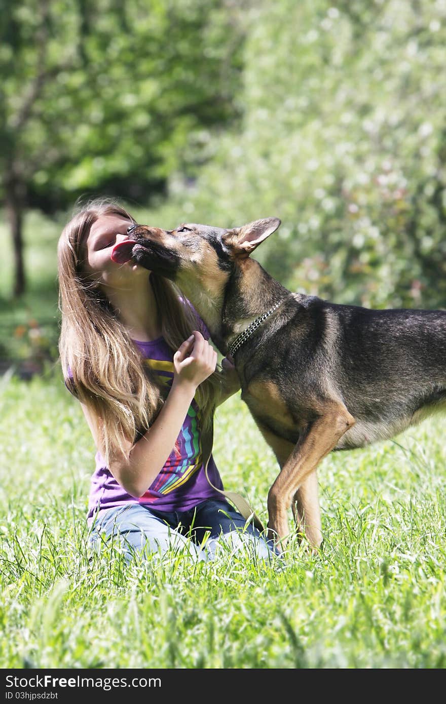 Girl with dog outdoors