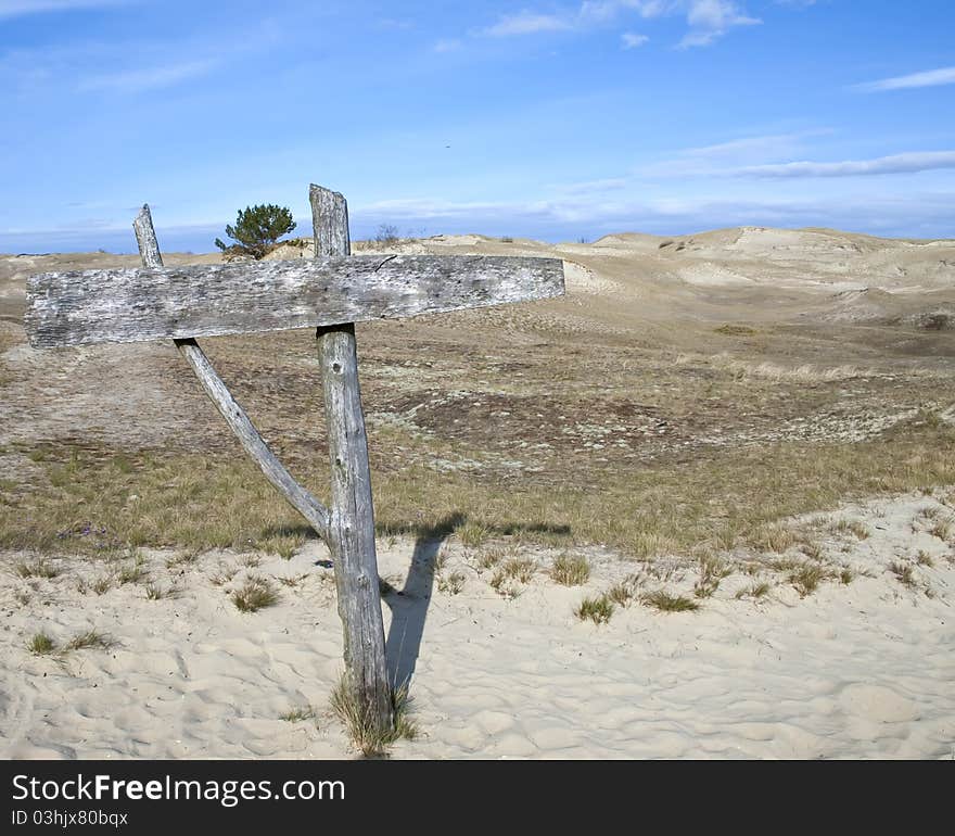 Wooden sign in beautiful landscape