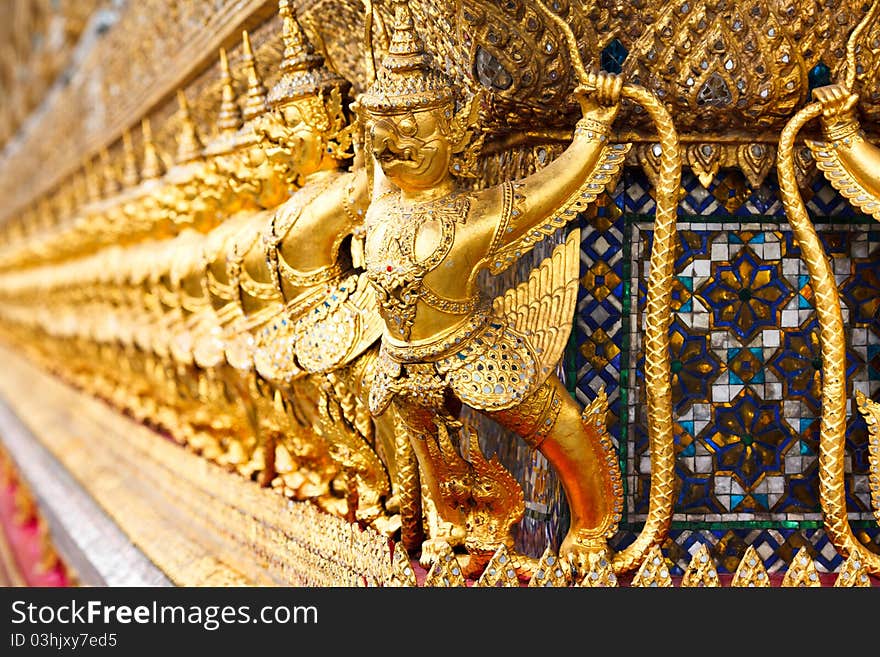 Ancient demon decoration at Wat Prakaew Bangkok Thailand. Ancient demon decoration at Wat Prakaew Bangkok Thailand