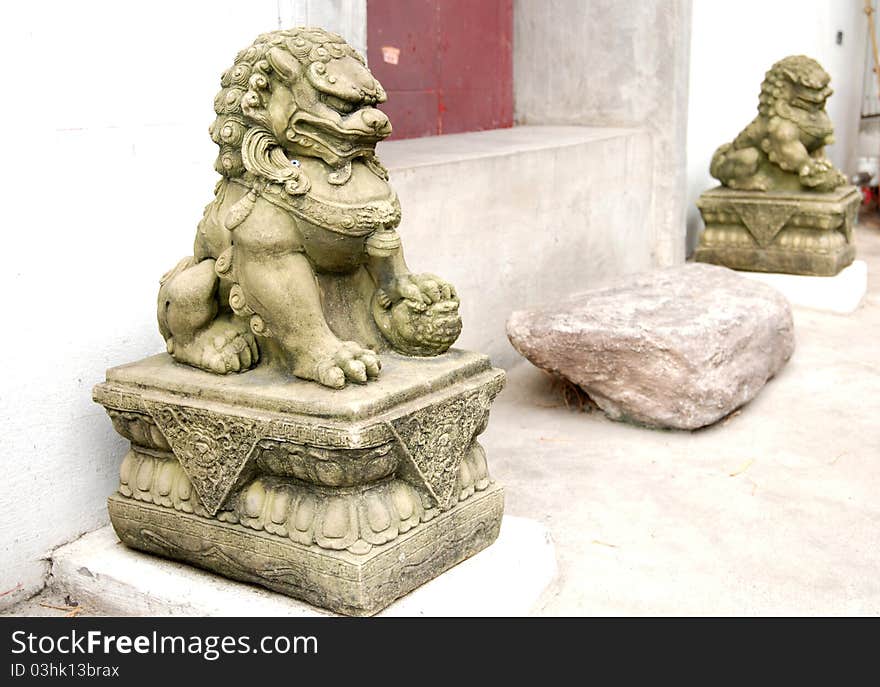 Stone Lion sculpture, symbol of protection & power