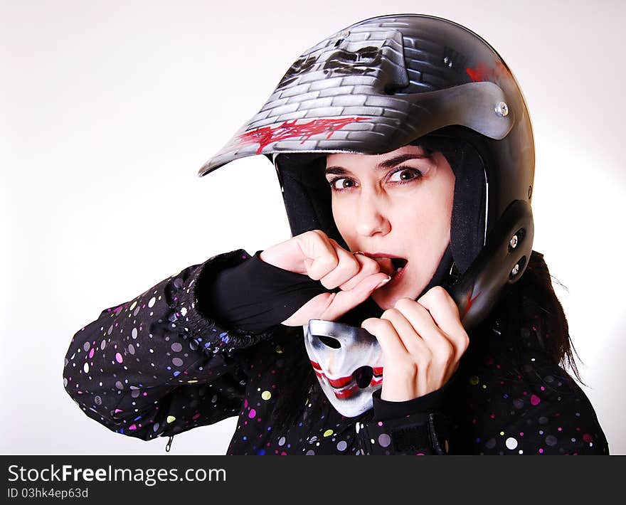 The girl the in a helmet of the motorcyclist. The girl the in a helmet of the motorcyclist.