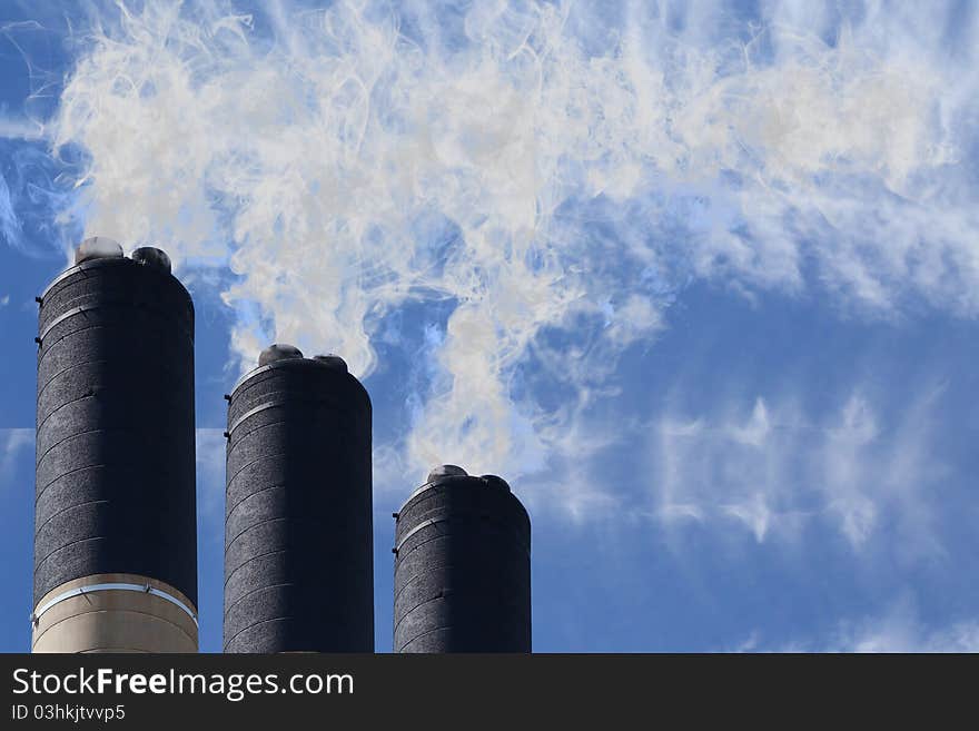 Row of concrete industrial chimnies