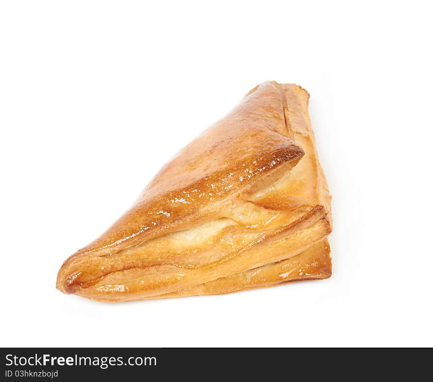 Puffpastry roll isolated on the white background