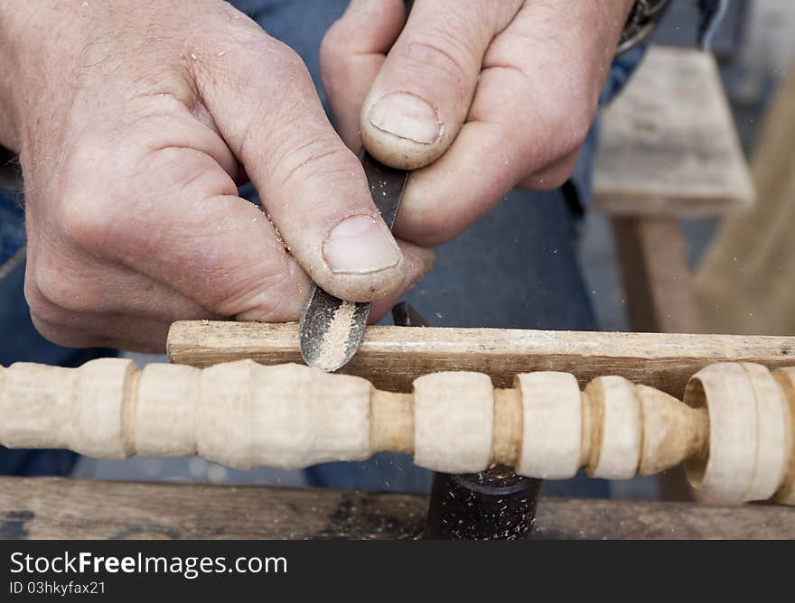 Wood carving process with metal chisel