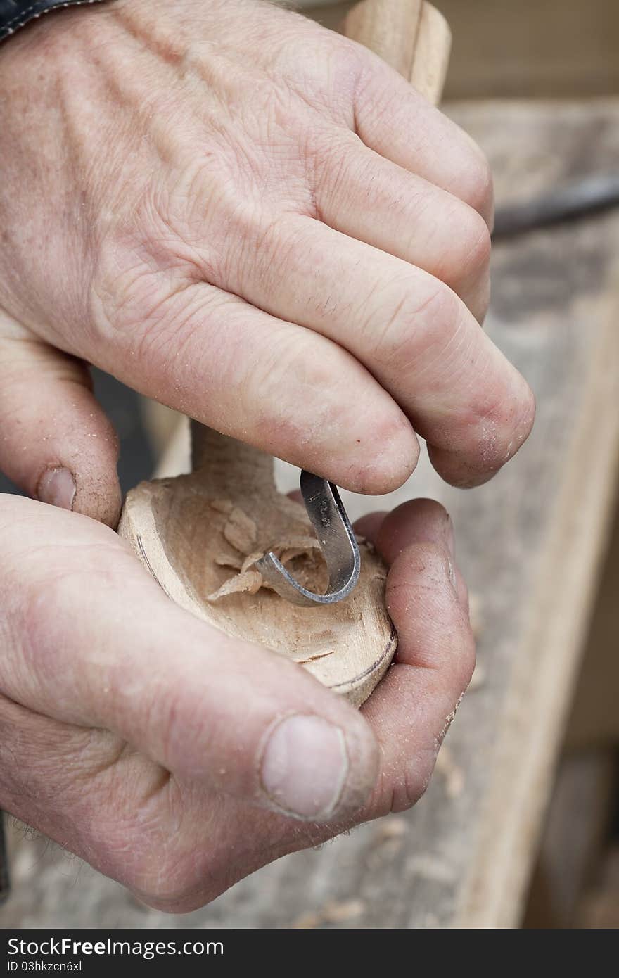 Wood carving process with metal chisel