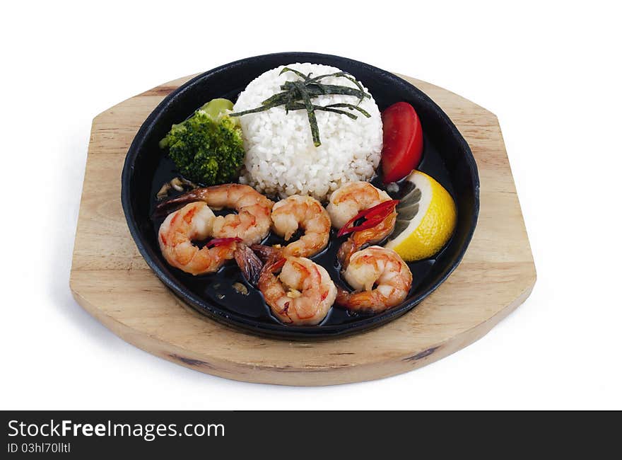 Photo of shrimps with vegetables on a plate