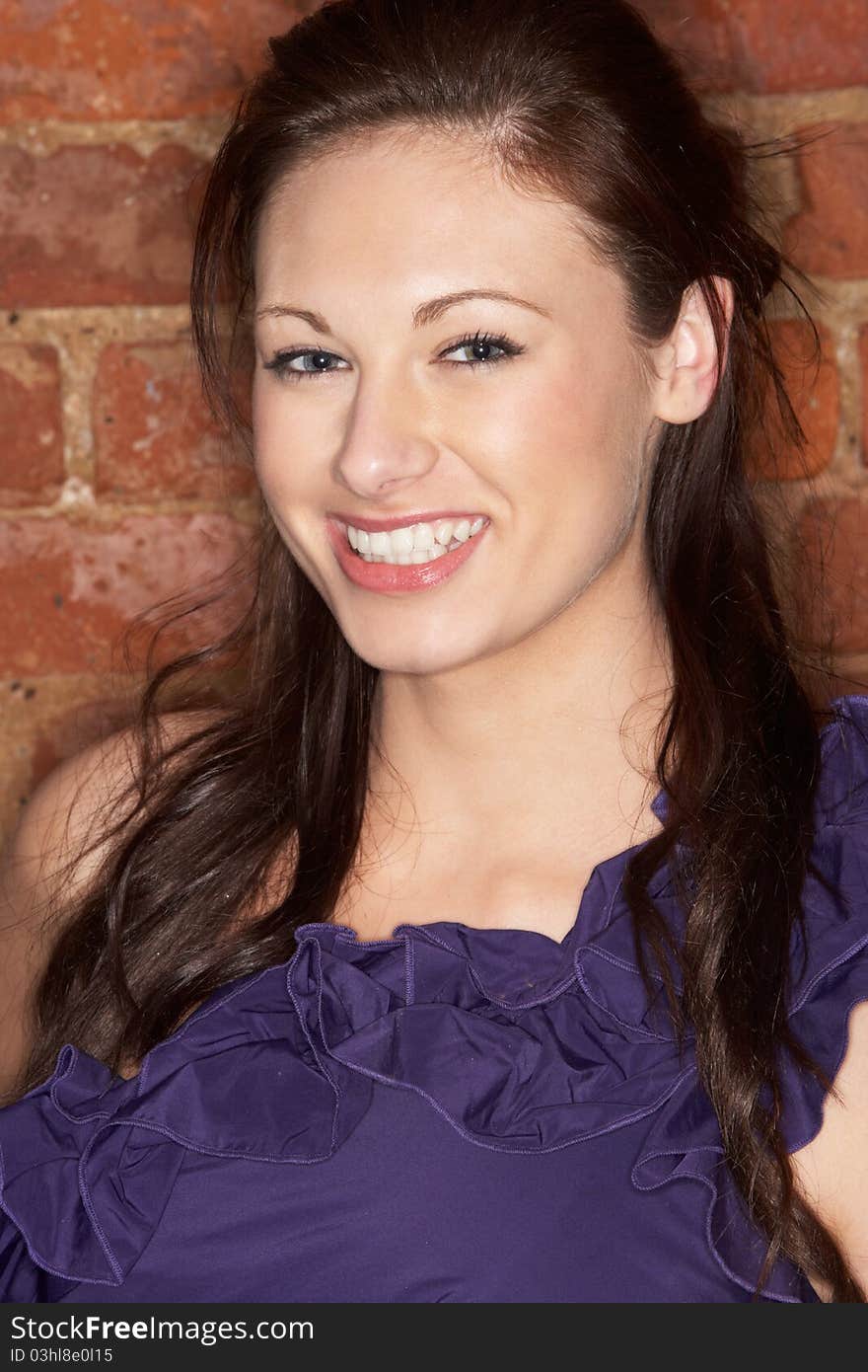 Portrait of young woman smiling at camera