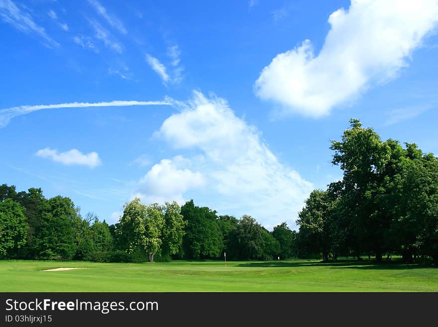 Golf course with blue sky