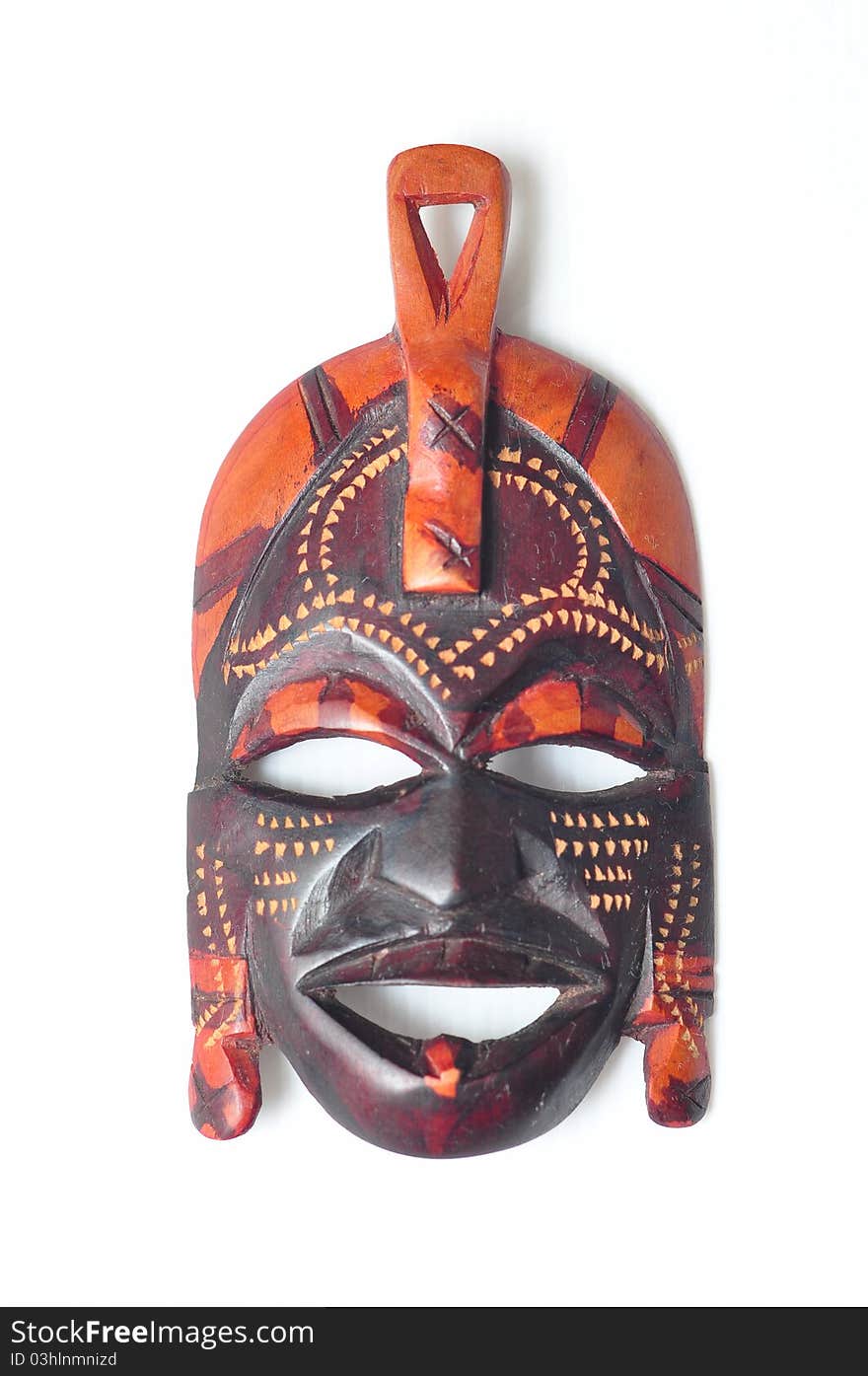 Wooden crafted voodoo mask in carnival