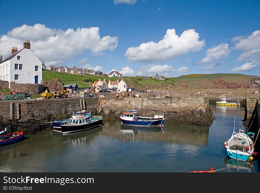 The town and harbour of st abbs in scotland. The town and harbour of st abbs in scotland