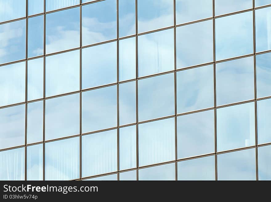 Clouds reflected in a building wall. Clouds reflected in a building wall