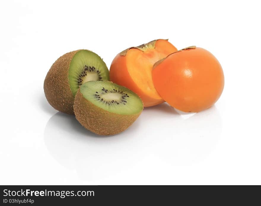 Kiwi and other fruit on isolated white background