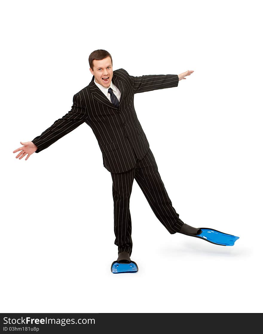 Man in a business suit and flippers for swimming