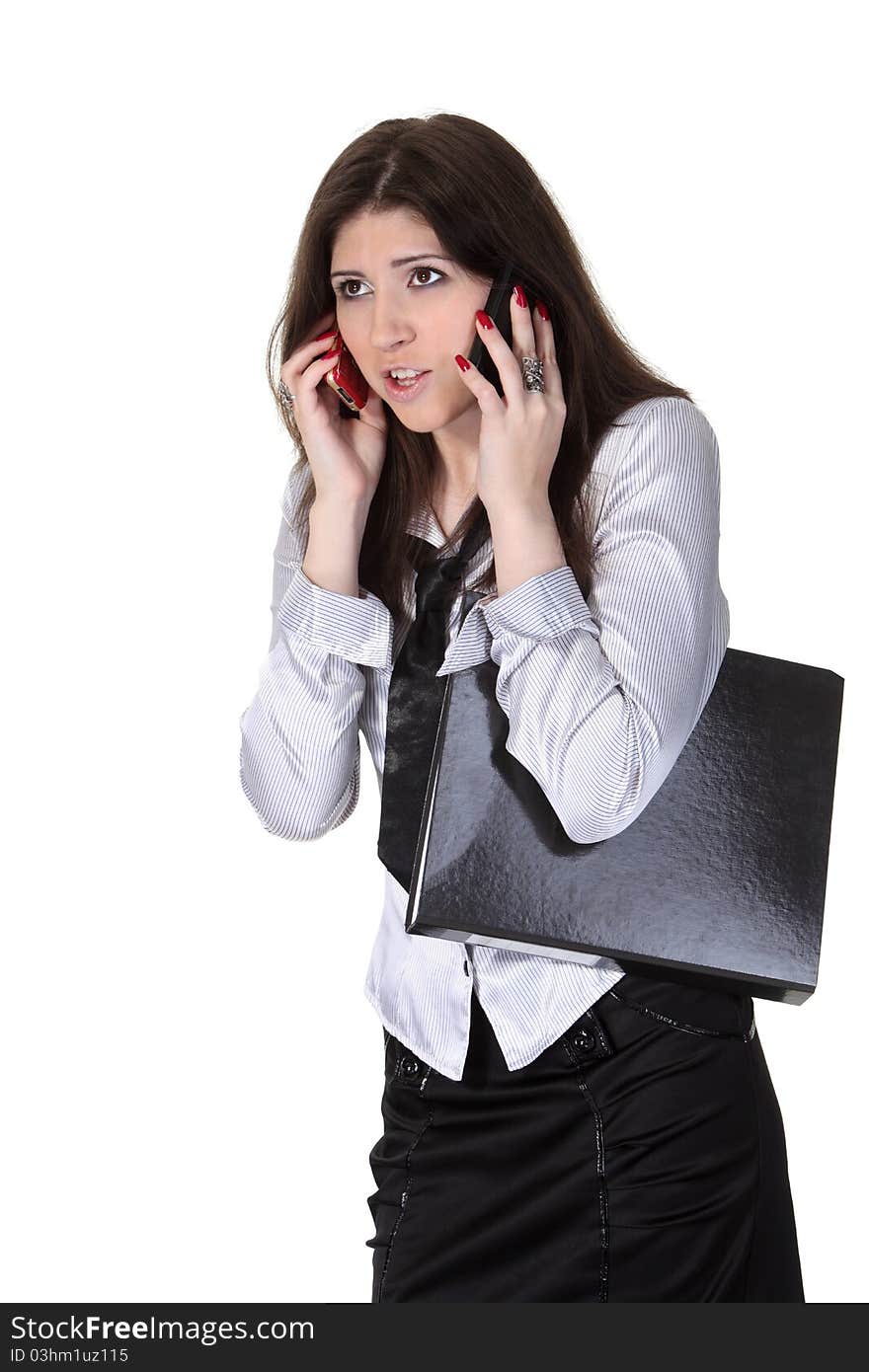 Angry young businesswoman speak two phones