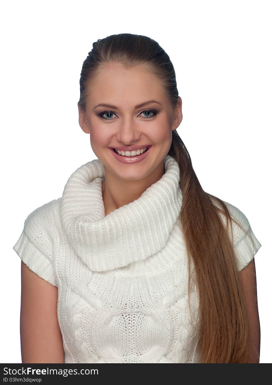 Portrait of a young woman in a light sweater on the isolated background