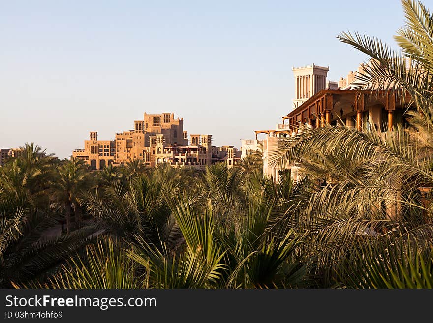 Madinat Jumeirah Resort in Dubai, surrounded with palm trees. Madinat Jumeirah Resort in Dubai, surrounded with palm trees