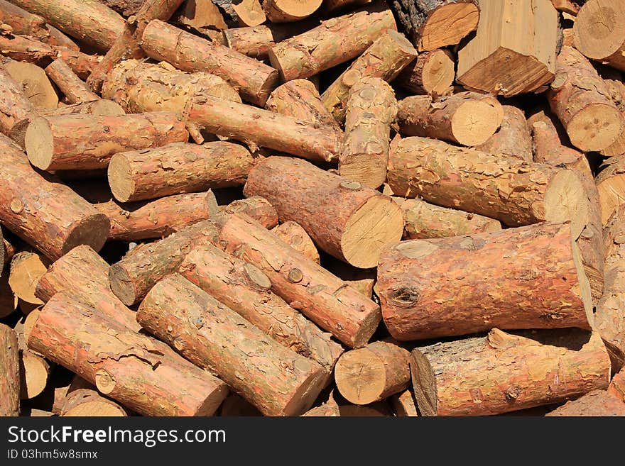 Heap of wooden chocks are used to heat homes. Heap of wooden chocks are used to heat homes.