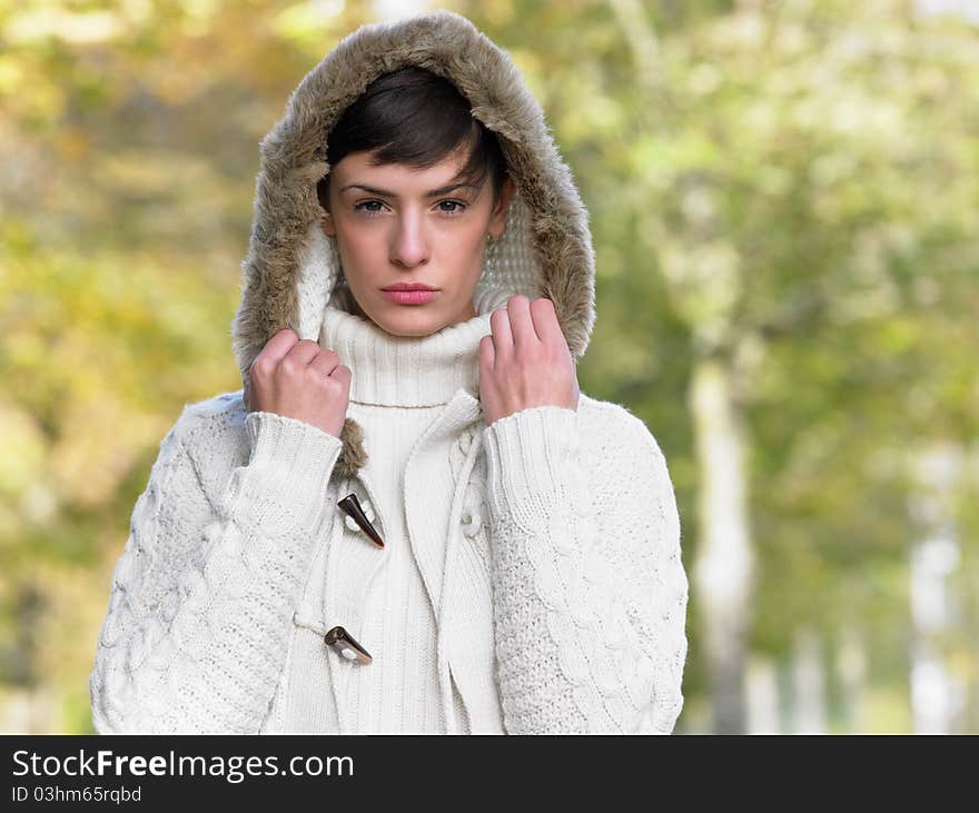 Portrait of young woman looking at camera