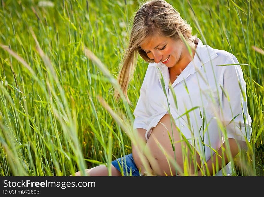 Woman outdoor with dandelion