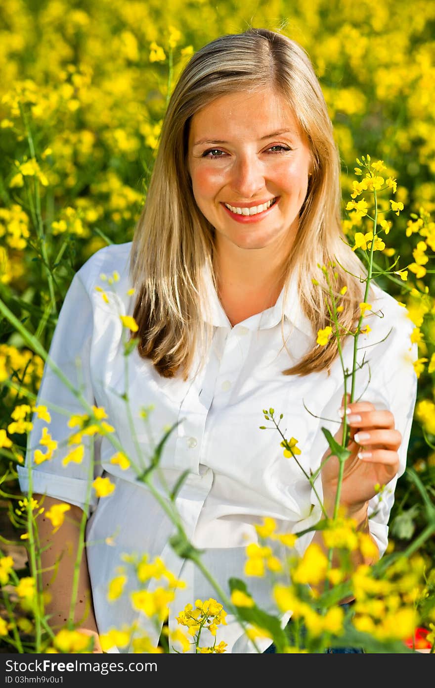 Woman outdoor with dandelion