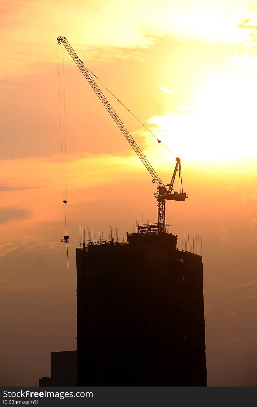 Building tower and yellow sky