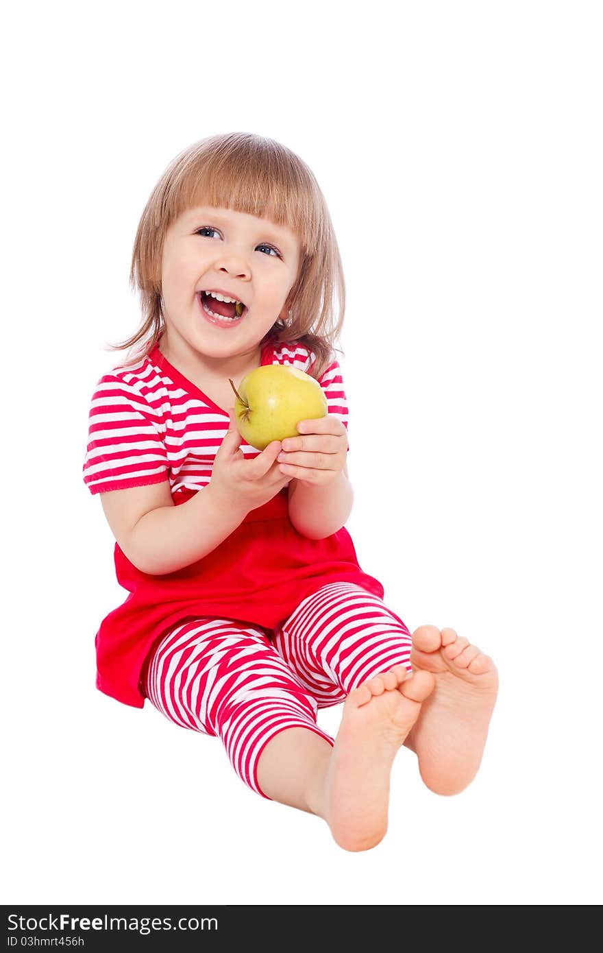 Little girl eating an apple