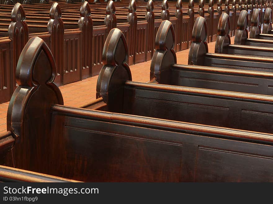 Hand crafted wooden pews in St. James Cathedral. Hand crafted wooden pews in St. James Cathedral