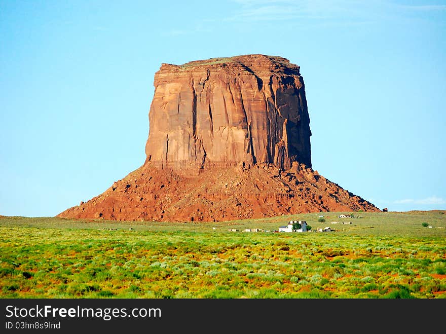 A big rock in the green monument valley. A big rock in the green monument valley