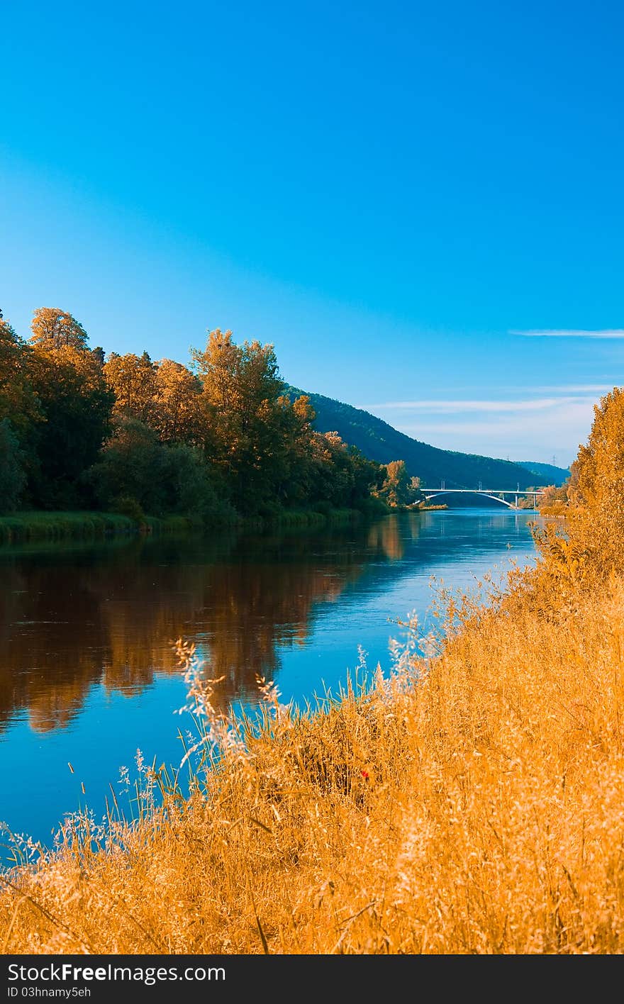 River Vltava With The Bridge