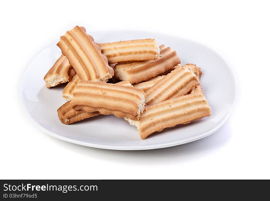 Plate of cookies isolated on white