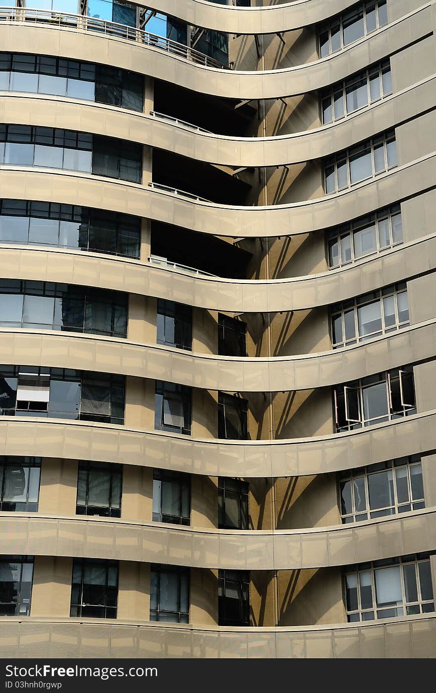 This was the exterior surface of a modern building. Many wave-shaped lines. This was the exterior surface of a modern building. Many wave-shaped lines.