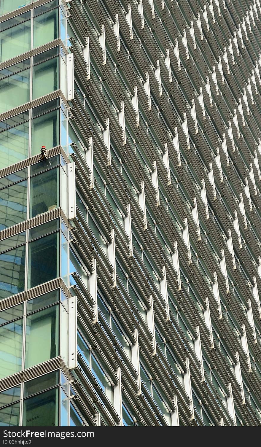 This was the exterior surface of a modern steel building, featured by ordered lines. This was the exterior surface of a modern steel building, featured by ordered lines.