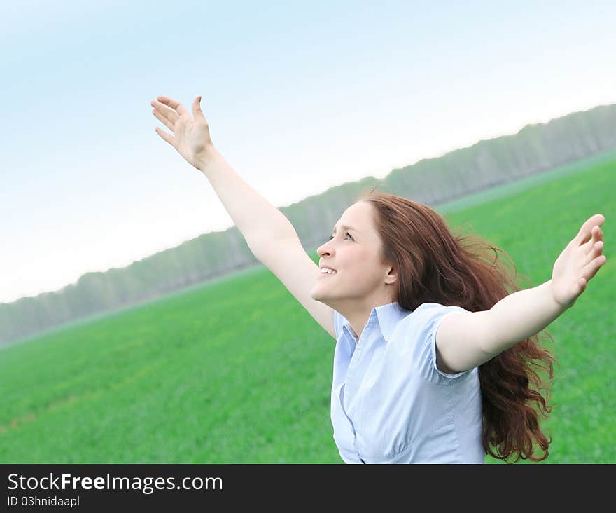 Girl walks in the field