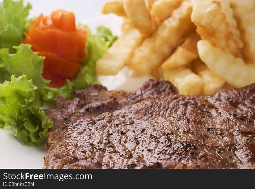 Steak, salad and french fries