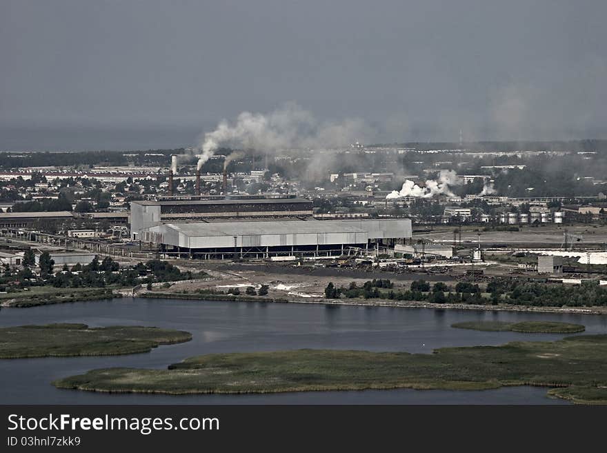 Aerial view of industrial area by the sea, city Li