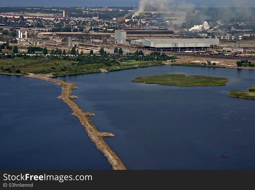 Aerial view of industrial area by the sea. Aerial view of industrial area by the sea.