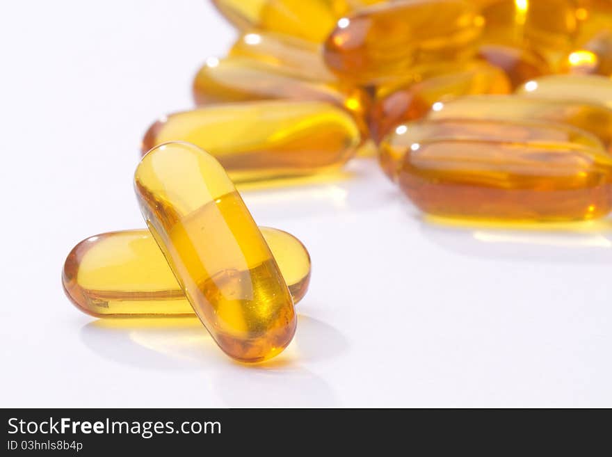 Yellow Pills Vitamin Soft Gels - fish oil. Yellow Pills Vitamin Soft Gels - fish oil