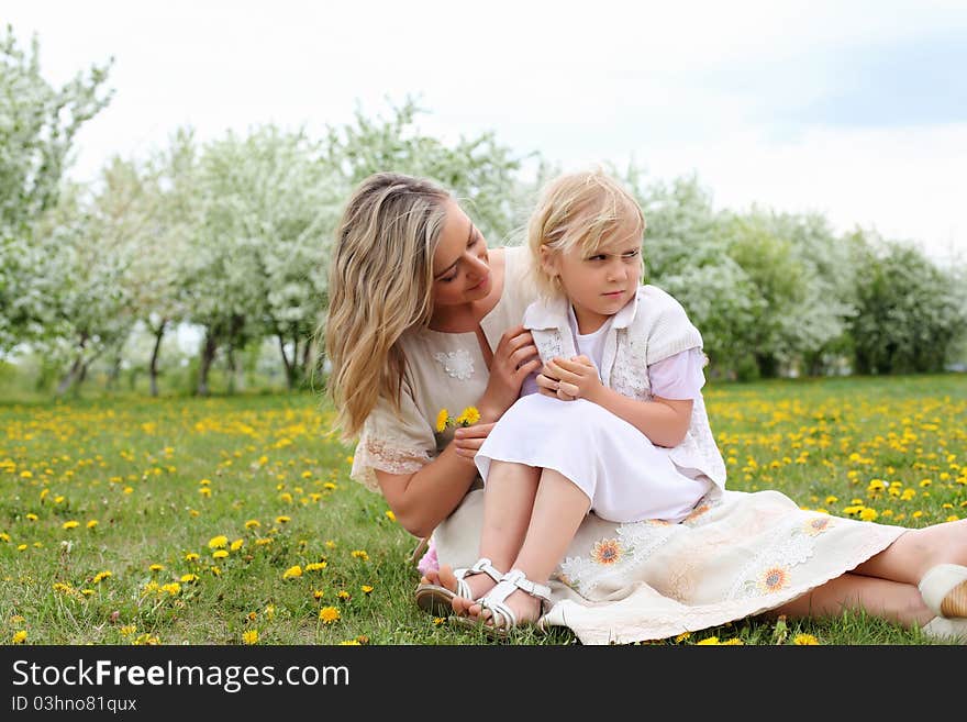 Girl with mother in the park